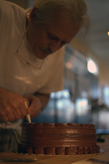Chef Ziggy Cichowski with a decorated cake